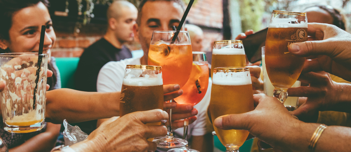 People holding drinks – nightlife in Swindon