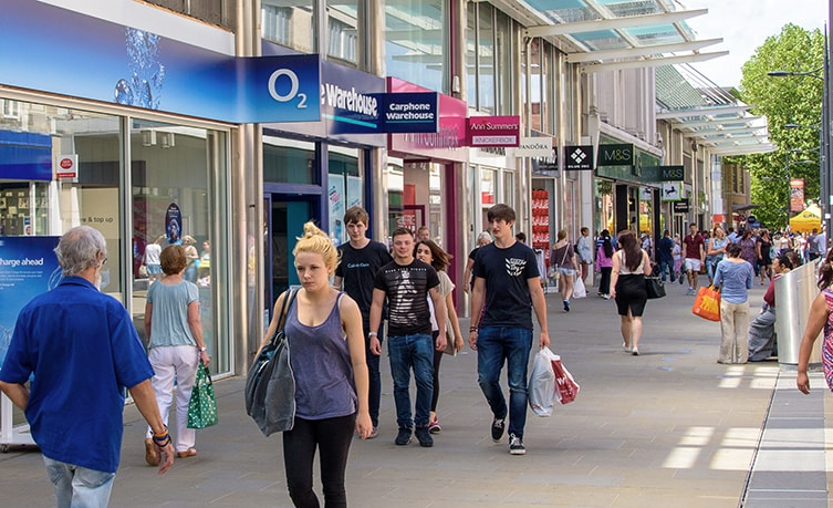 Swindon town centre shopping – pedestrian street with shops including O2, M&S, Pandora